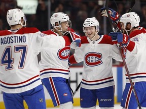 Montreal Canadiens celebrate defenceman Jeff Petry's goal against the Carolina Hurricanes in Montreal on Dec. 13, 2018.