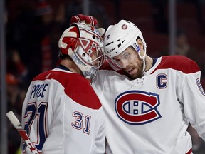Canadiens captain Shea Weber and goaltender Carey Price celebrate after 6-4 win over the Carolina Hurricanes on Dec. 13, 2018 at the Bell Centre in Montreal.