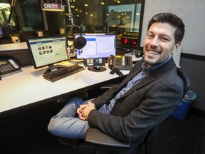 Elias Makos tries out the host's chair in the studio at CJAD in Montreal Monday December 17, 2018 after the station announced he will be taking over the mid-morning hosting duties.