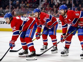 Montreal Canadiens, from left, Jonathan Drouin, Andrew Shaw and Shea Weber line up for a faceoff during second period of National Hockey League game agains the Boston Bruins in Montreal Monday December 17, 2018.