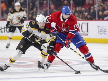 Brett Kulak leans on Boston Bruins' Joakim Nordstrom during second period in Montreal Monday, Dec. 17, 2018.