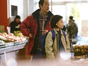 Osamu (Lily Franky, left) and Shota (Kairi Jyo) steal out of love in Shoplifters.