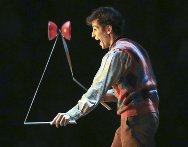 A juggler performs with the chorus during opening night performance of Cirque du Soleil's Corteo in Montreal Dec. 19, 2018.