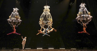 Acrobats representing Mauro's former lovers swing from chandeliers during opening night performance of Cirque du Soleil's Corteo in Montreal Dec. 19, 2018.