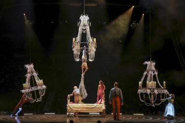 Former lovers descend from chandeliers to visit Mauro on his deathbed during opening night performance of Cirque du Soleil's Corteo in Montreal Dec. 19, 2018.