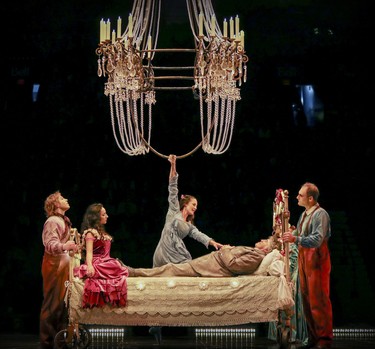 A former lover visits clown Mauro on his deathbed during opening night performance of Cirque du Soleil's Corteo in Montreal Dec. 19, 2018.