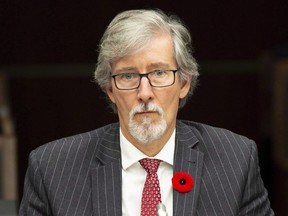 Privacy Commissioner Daniel Therrien waits to appear at the House of Commons information, privacy and ethics committee in Ottawa, Thursday Nov. 1, 2018. THE CANADIAN PRESS/Adrian Wyld