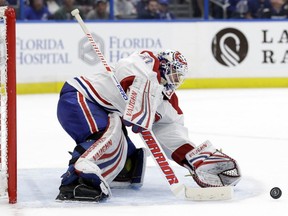 Canadiens goaltender Antti Niemi makes a save on a shot by the Tampa Bay Lightning on Saturday, Dec. 29, 2018, in Tampa, Fla.