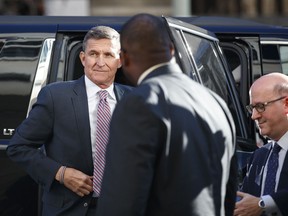 President Donald Trump's former National Security advisor Michael Flynn arrives at federal court in Washington, Tuesday, Dec. 18, 2018.