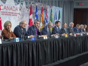 First Ministers's closing conference on Dec. 7, 2018 in Montreal, from left: Rachel Notley, Alberta; Wade MacLauchlan, PEI; Stephen McNeil, Nova Scotia; Blaine Higgs, New Brunswick; Prime Minister Justin Trudeau; Quebec Premier François Legault; John Horgan, British Columbia; Scott Moe, Saskatchewan; Dwight Ball, Newfoundland; and Sandy Silver, Yukon.