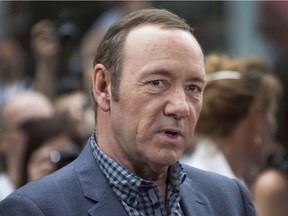 FILE - In a Monday, June 9, 2014 file photo, U.S. actor Kevin Spacey arrives for the European Premiere of Now, at a cinema in central London. A Massachusetts woman, Linda Louise Culkin of Quincy, Mass., who threatened to blow up, torture and castrate Spacey in what prosecutors called a "persistent and malevolent" cyberstalking campaign, was sentenced Wednesday, Sept. 17, 2014, to more than four years in prison. A federal judge in Boston also ordered Culkin to pay Spacey $124,000 in restitution for bodyguards.The 55-year-old Culkin has been jailed since January 2012, meaning she has about 18 months left to serve. She pleaded guilty in November to charges including mailing threatening communications, and sending false information regarding explosives.