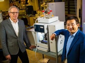 Roger Dixon, left, professor of psychology at the University of Alberta, teamed up with Liang Li, professor of chemistry at the University of Alberta, to tackle a huge problem, predicting Alzheimer’s disease before symptoms arise.