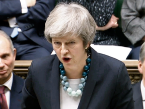 Britain's Prime Minister Theresa May speaks in the House of Commons, in London, Dec. 10, 2018.