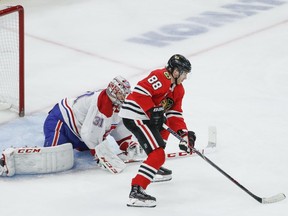 Chicago Blackhawks right wing Patrick Kane looks for an opening against Montreal Canadiens goaltender Carey Price during the third period on Dec. 9, 2018, in Chicago.