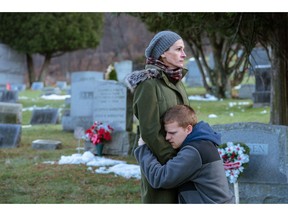 This image released by Roadside Attractions shows Lucas Hedges, right, and Julia Roberts in a scene from "Ben is Back" in this undated handout photo. When Julia Roberts arrived at the recent Toronto International Film Festival with a drama about drug addiction, rapper Mac Miller had just died of what was later deemed an accidental overdose, and singer-actress Demi Lovato was recovering from an overdose in the summer.