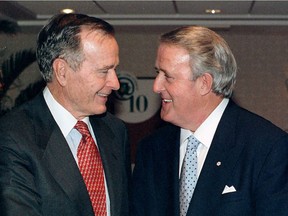 George H.W. Bush with Brian Mulroney at a free-trade conference at Montreal's Hôtel du Parc in 1999.