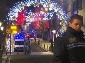 In this image made from video, emergency services arrive on the scene of a Christmas market in Strasbourg, France, Tuesday, Dec. 11, 2018. A French regional official says that a shooting in Strasbourg has left at least one dead and several wounded in the city center near a world-famous Christmas market. The prefect of France's Bas-Rhin region says the gunman, who is still at large, has been identified. Authorities haven't given a motive for the shooting.