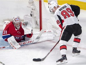 Canadiens goaltender Carey Price stops Ottawa Senators left-wing Mikkel Boedker during first period on Dec. 4, 2018, in Montreal.