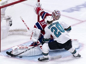 Canadiens goaltender Carey Price makes a save off San Jose Sharks' Marcus Sorensen in Montreal on Sunday, Dec. 2, 2018.