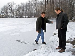 Back in 2001, Adam Wyroslak watches Andrzej Oles test the ice on Lake of Two Mountains where they had earlier helped Thomas Reyburn get his son Nicolas Reyburn out of the frigid waters. The boy had tried to get his dog out of the water when he fell in.