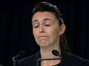 New Zealand Prime Minister Jacinda Ardern reacts at a press conference when she spoke about murdered British tourist Grace Millane during her weekly post-Cabinet press conference in Wellington, New Zealand, Monday, Dec. 10, 2018. Ardern made an emotional apology to the family of a 22-year-old British tourist who police say was murdered. Ardern spoke about the nation's reaction to the case several hours after the man that police accuse of killing Grace Millane made his first appearance in court. (Mark Mitchell/New Zealand Heralds via AP) ORG XMIT: NZH801