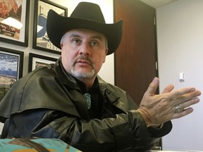 In this April 26, 2018 file photo, Gavin Clarkson of Lac Cruces, N.M., speaks at the Albuquerque bureau of The Associated Press. A District of Columbia clerk refused to accept Clarkson's state driver's license for a marriage license because she and her supervisory believed New Mexico was a foreign country.