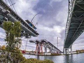 The main structure of the new Champlain Bridge should be completed by Dec. 21, but it won't be open to traffic until the summer of 2019.