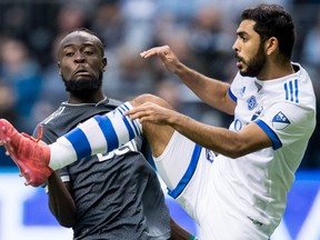 The Montreal Impact's Victor Cabrera, right battling Vancouver's Kei Kamara, on March 4, 2018, is among the Impact players the MLS team protected ahead of the 2018 MLS expansion draft.