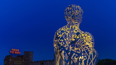 Montreal received this public artwork, Source by Spanish artist Jaume Plensa, for its 375th anniversary, thanks to the contribution of two major patrons, France Chrétien Desmarais and André Desmarais. The sculpture is on loan to Montreal for at least 25 years. I like the idea of combining the new artwork with the Farine Five Roses sign, which is, in my view, a piece of art on its own.
