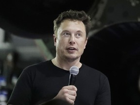FILE - In this Sept. 17, 2018, file photo SpaceX founder and chief executive Elon Musk speaks in Hawthorne, Calif. Tesla CEO Elon Musk is dismissing the ability of the company's new board chairwoman to exert control over his behavior.Musk says "it's not realistic" to think that Robyn Denholm will be reining him in because he remains the electric car company's largest shareholder. Musk spoke on CBS' show "60 Minutes," broadcast Sunday, Dec. 9, 2018.
