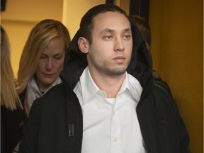 Jordan Xavier Taylor leaves the courtroom after his hearing at the Montreal courthouse on Wednesday.