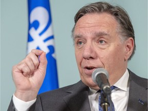 Premier François Legault says he won't modify Bill 101 but will apply it in full.