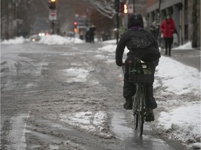 A cyclist makes his way along the Laurier bike path near Mentana on Wednesday, Jan. 9, 2019.