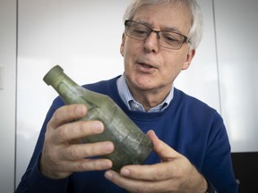 André Burroughs, an environmental adviser with Hydro-Québec, said archeological excavations yielded several artifacts from the mid-1800s, including the bottle shown, on a site near the burial place of 6,000 Irish Famine migrants who died in 1847-48 near Bridge St.