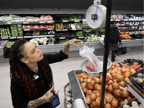 Employees filling out online orders are told to focus on personalized service — such as hand-written notes — and to choose fresh produce "like you're picking for your mother,” says Amanda Harris, a Provigo store manager.