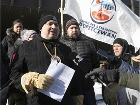 “This is about recognizing our existence on this territory, our title, our language and our ancestors,” Atikamekw Chief Christian Awashish, left, said outside the Montreal courthouse Tuesday. "After 40 years of negotiations ... I don’t think anyone can accuse us of lacking patience."