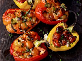 Tomatoes seal up the stuffing for Dorie Greenspan's peppers.