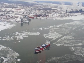 Ships stuck in the Old Port of Montreal by ice jams were finally able to leave and continue on their way along the St. Lawrence River. Here, a ship near near Sorel.