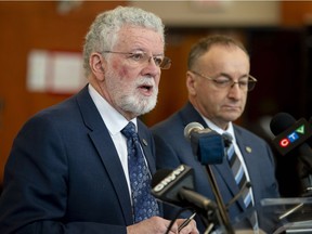 Noel Burke left, chairperson of the Lester B. Pearson School Board and Michael Chechile right, the director general of the Lester B. Pearson School Board speak to the press in Dorval about the about the Quebec government's plan to take the Riverdale School from the Lester B. Pearson School Board and give it to the Commission scolaire Marguerite Bourgeoys on Monday, January 28, 2019. (Peter McCabe / MONTREAL GAZETTE) ORG XMIT: 62054