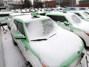 Téo Taxi cabs were all parked in the company's lot on St-Patrick St. in Montreal after the company stopped operating Jan. 29, 2019.