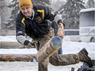 Jordan Bauchman from Dalhousie Agricultural Campus in Truro, Nova Scotia throws a log during the pulp toss event at the 59th annual Woodsmen competition at the MacDonald Campus of McGill University in Ste-Anne-de-Bellevue on Saturday Jan. 26, 2019.