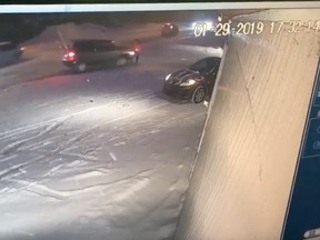 Surveillance video shows a man hit by a vehicle in Île-Perrot on Jan. 29.