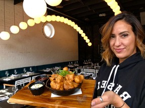 Kimberly Lallouz serves up popcorn chicken at Bird Bar, just one of her Montreal restaurants. Before she became a full-time chef, Lallouz spent time in the fashion industry and in commercial real estate. But her catering jobs started snowballing via Facebook, she says, and "social media became my calling card."