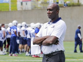 Alouettes general manager Kavis Reed watches his team during the first day of training camp in Montreal on May 20, 2018.