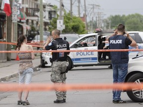 Police investigate the scene of Angelo D'Onofrio's death in June 2016. D'Onofrio was fatally shot by a lone gunman.