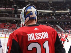 Anders Nilsson #31 of the Ottawa Senators wears a rainbow flag on the back of his goalie mask.