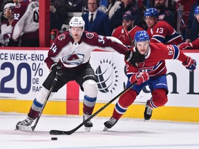 Carl Soderberg of the Colorado Avalanche, left, and Canadiens' Jonathan Drouin skate after the puck at the Bell Centre on Saturday, Jan. 12, 2019, in Montreal.