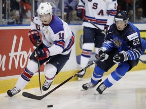 Habs prospect Ryan Poehling of the U.S. is chased by Finland's Santeri Virtanen during the world junior tourney last month. Several sources indicate Poehling, 20, enjoys school and wants to graduate university along with older twin brothers.
