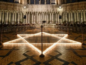 Six hundred candles in the form of the Star of David are set out on the floor during an event to commemorate Holocaust Memorial Day in Chapter House at York Minster on January 24 in England.