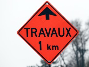 Construction detour road sign in Montreal.